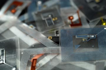 You've probably seen RFID tags like these inserted into the packaging of DVDs and other consumer products.  You've probably seen RFID tags like these inserted into the packaging of DVDs and other consumer products.